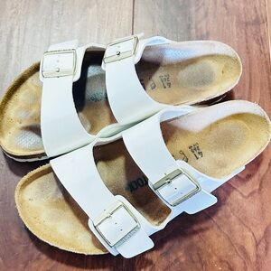 Birkenstock White Sandals with Gold Buckles